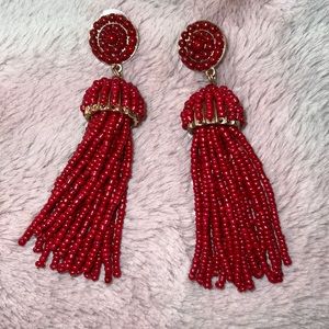 Francesca’s long red beaded earrings
